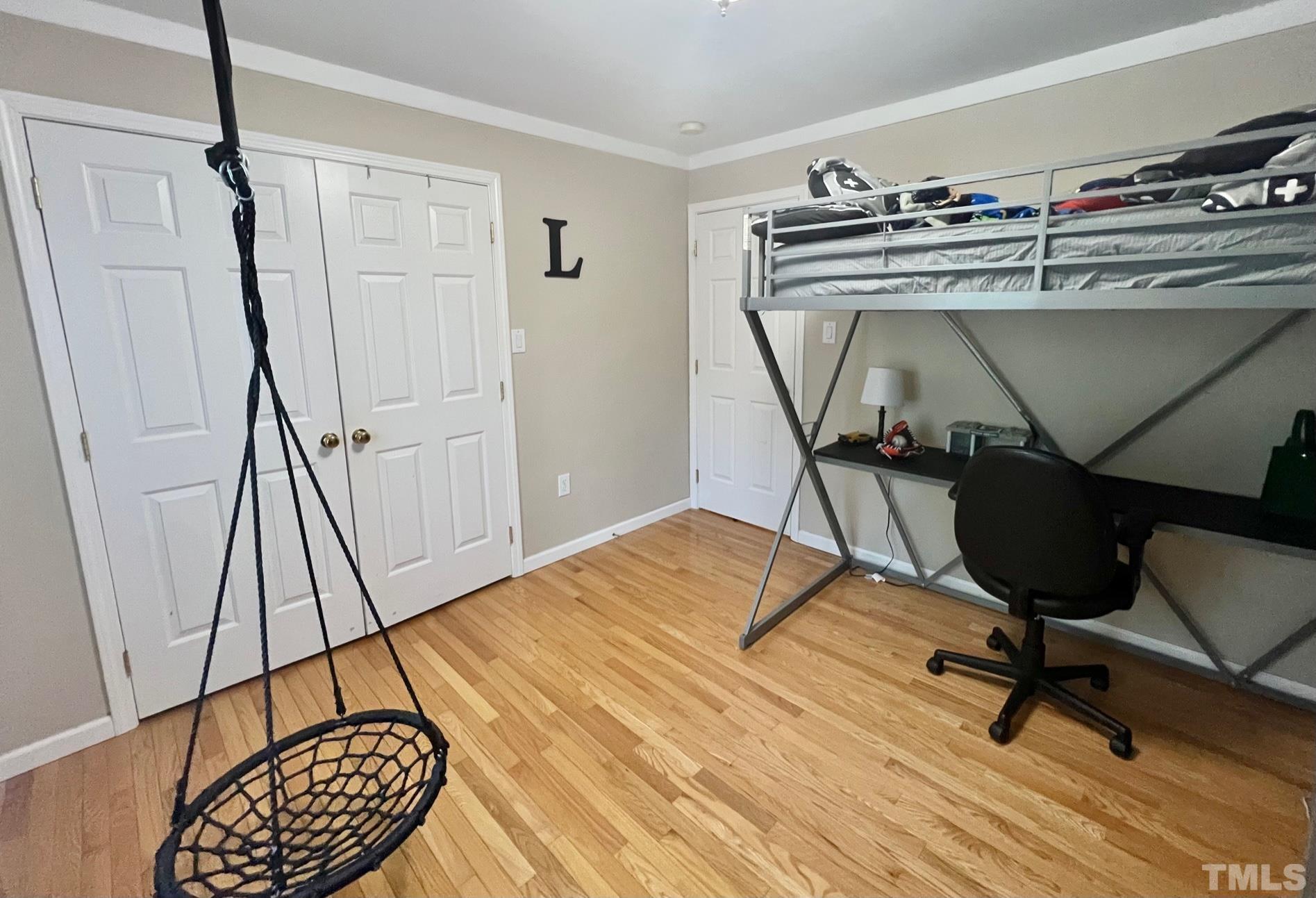1665 Billy Hicks Road Roxboro, NC 27574 - Photo 10 of 24 a view of a livingroom with furniture and hardwood floor
