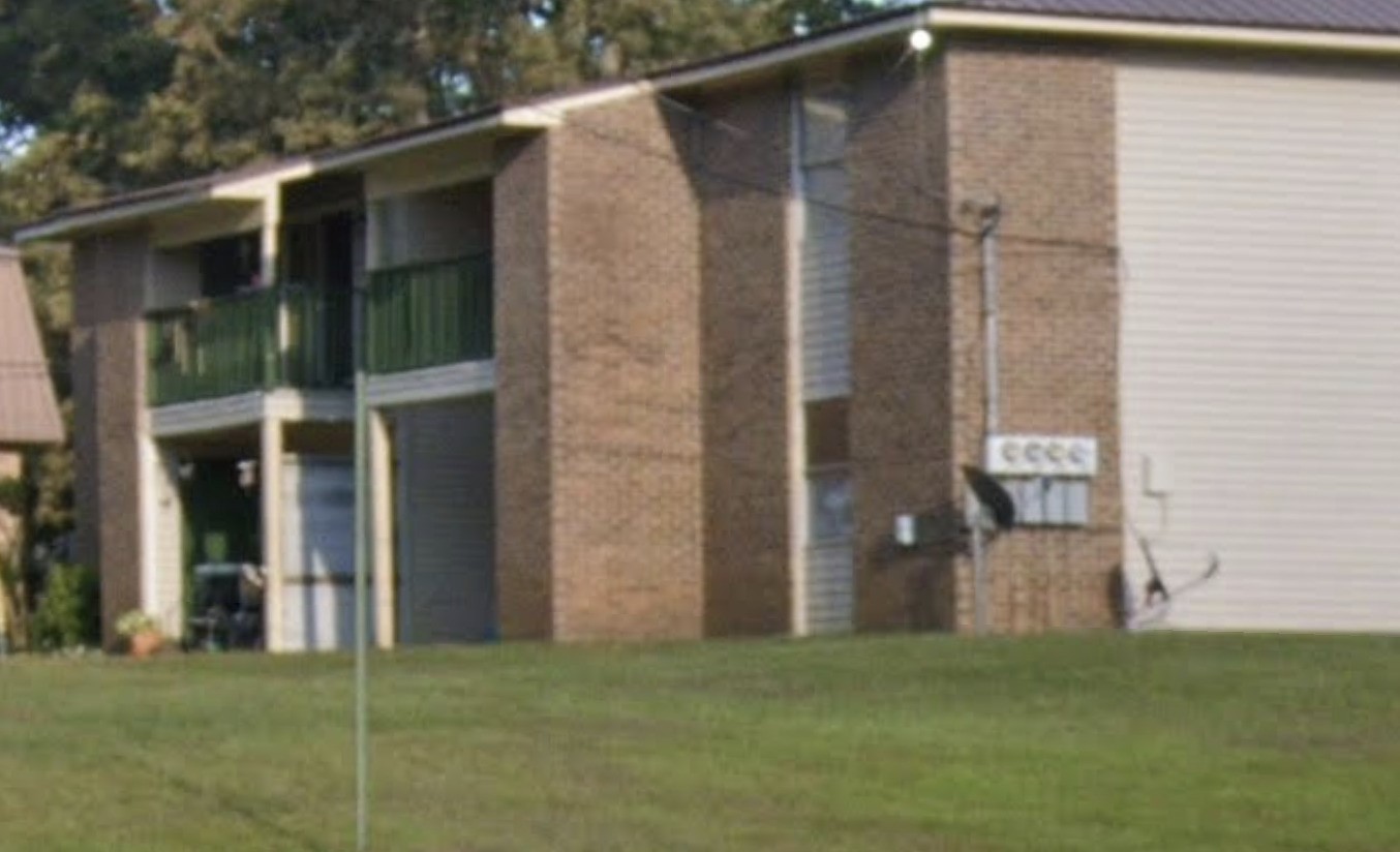 2403 Greenleaf Drive Other, AL 35565 - Photo 6 of 6 a brick house with a small yard