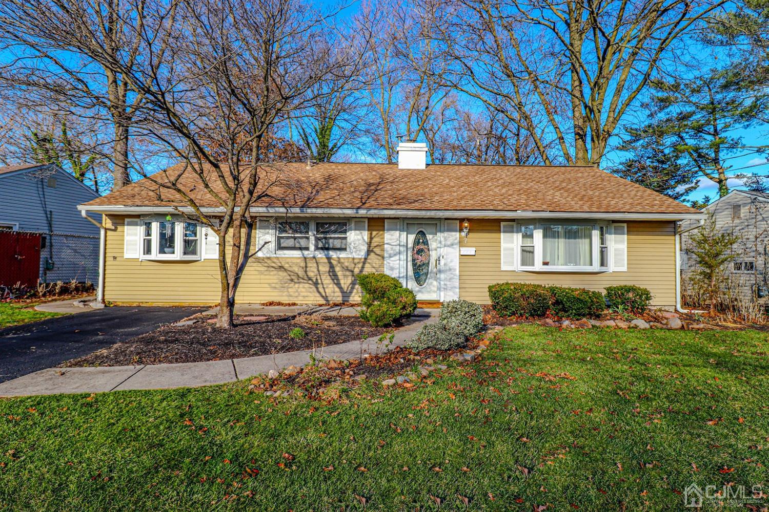 7 Dayton Road Edison, NJ 08817 - Photo 1 of 25 a house view with a sitting space and garden