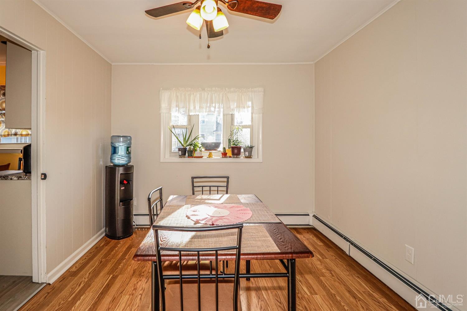 7 Dayton Road Edison, NJ 08817 - Photo 12 of 25 a view of a dining room with furniture window and wooden floor