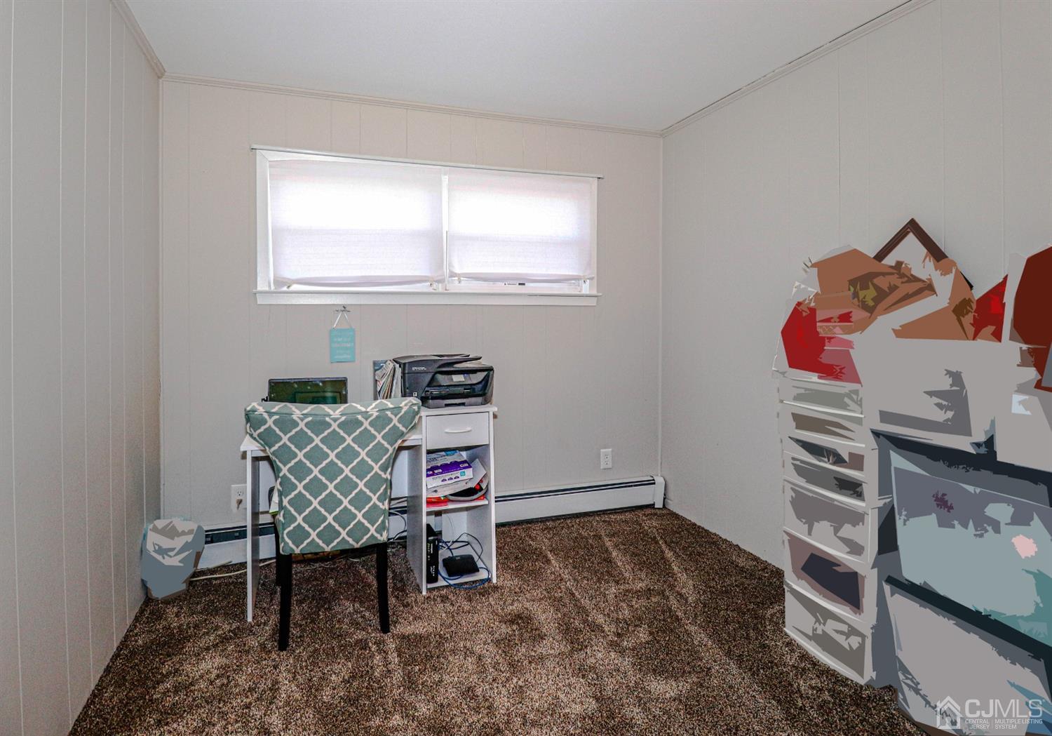 7 Dayton Road Edison, NJ 08817 - Photo 17 of 25 a room with a workspace