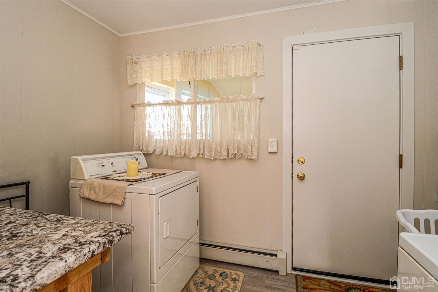 7 Dayton Road Edison, NJ 08817 - Photo 20 of 25 a utility room with dryer and washer
