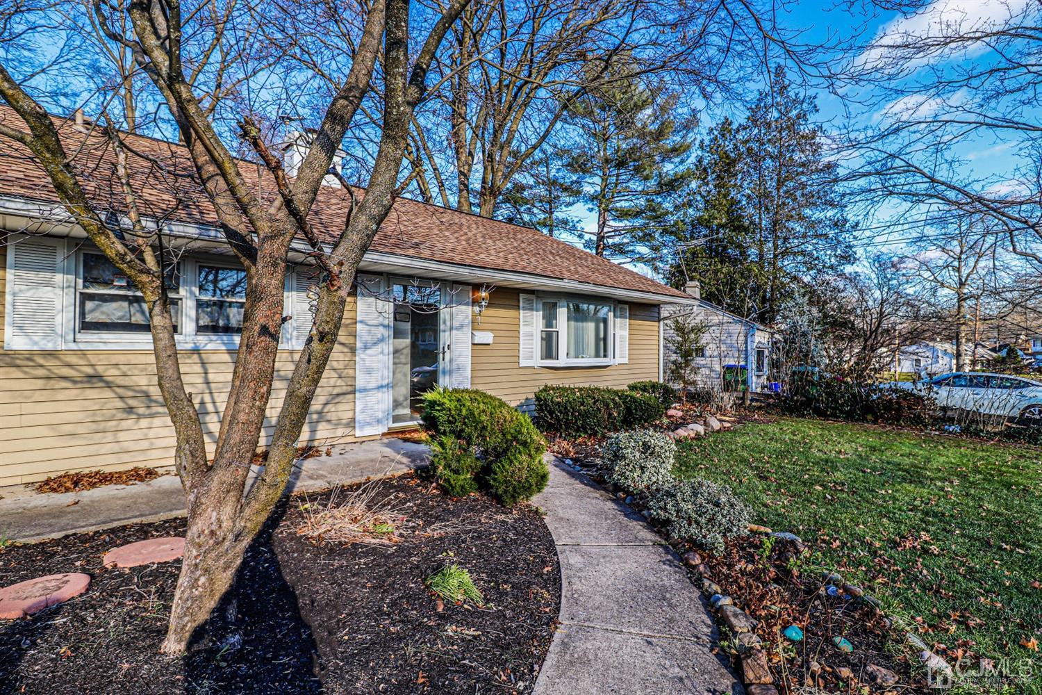7 Dayton Road Edison, NJ 08817 - Photo 3 of 25 a front view of a house with garden