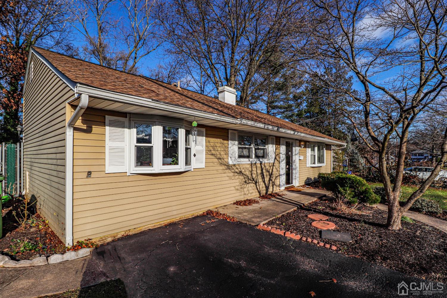 7 Dayton Road Edison, NJ 08817 - Photo 22 of 25 a front view of a house with a yard