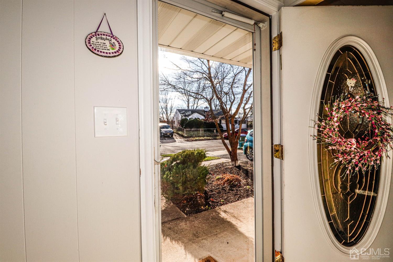 7 Dayton Road Edison, NJ 08817 - Photo 4 of 25 a view of front door with wooden floor