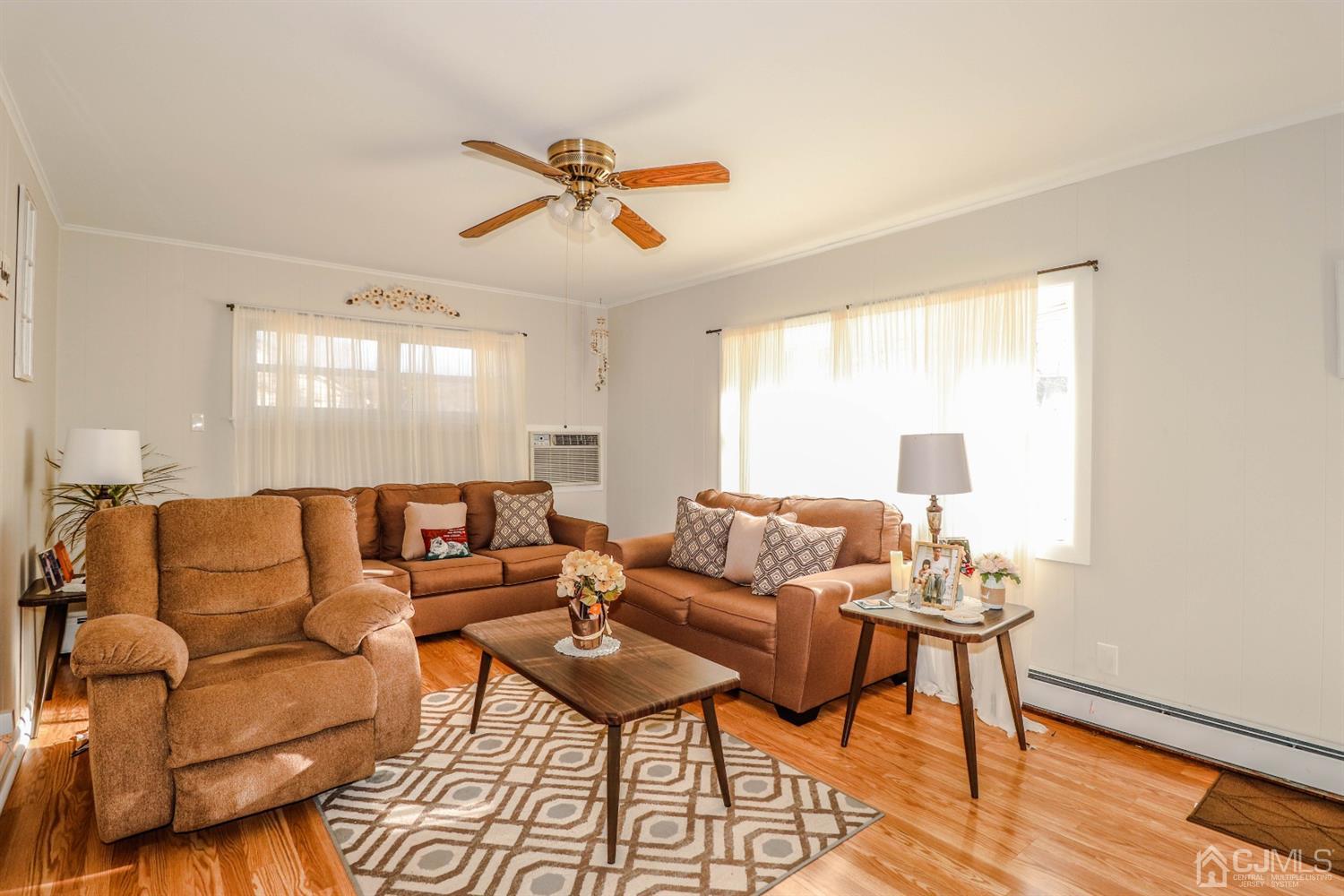 7 Dayton Road Edison, NJ 08817 - Photo 6 of 25 a living room with furniture and a large window