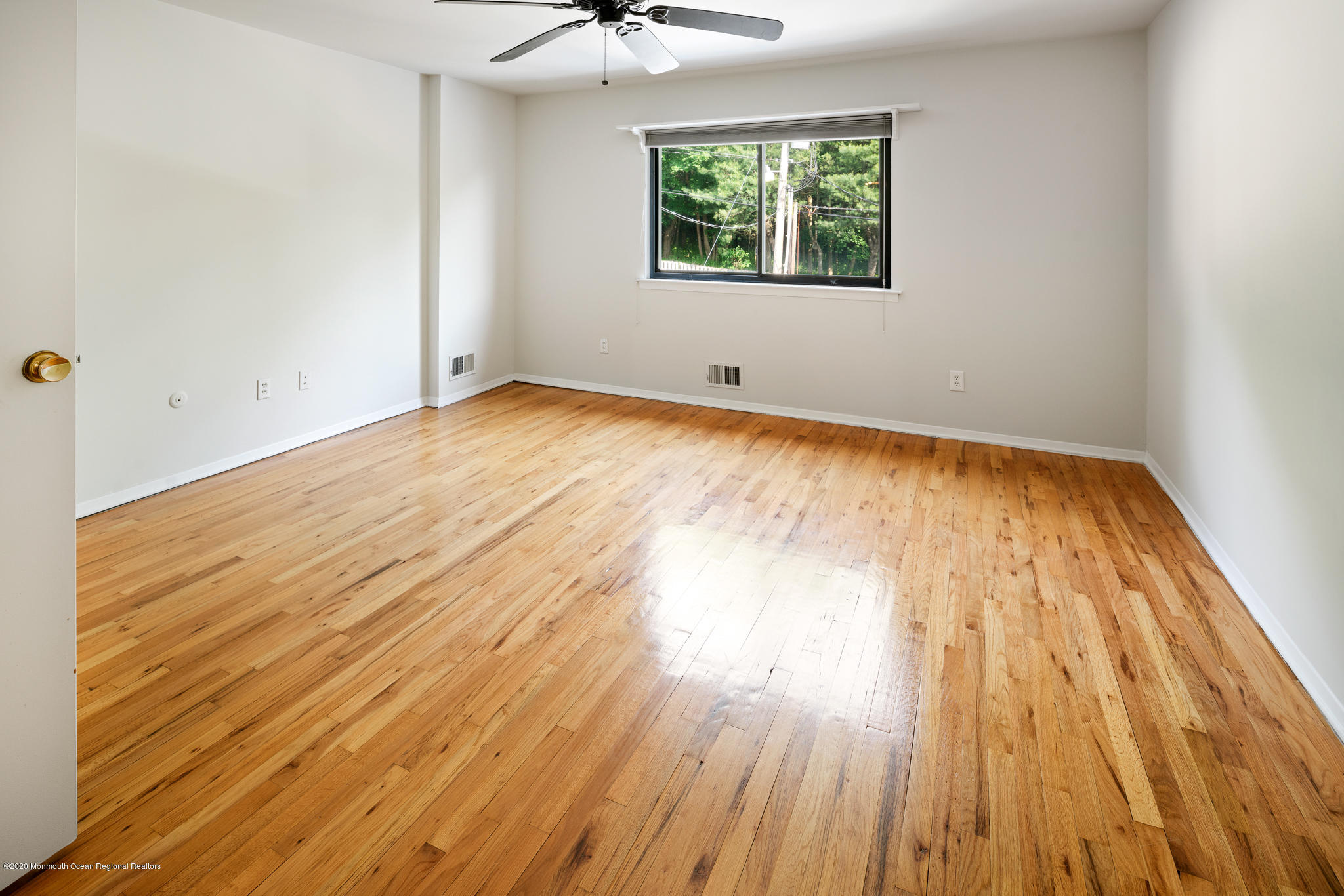 321 Spring Street, Unit 29 Red Bank, NJ 07701 - Photo 12 of 21 wooden floor in an empty room