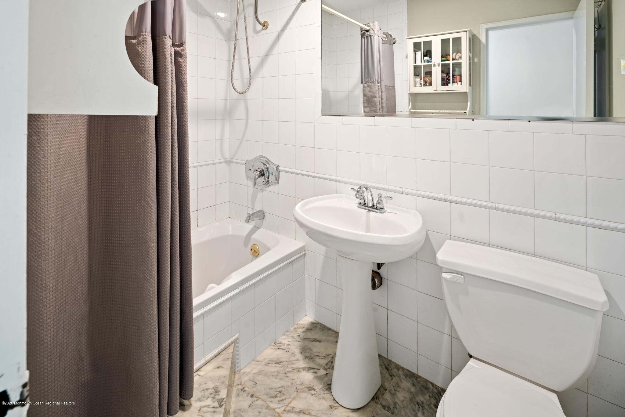 321 Spring Street, Unit 29 Red Bank, NJ 07701 - Photo 15 of 21 a bathroom with a sink toilet and shower