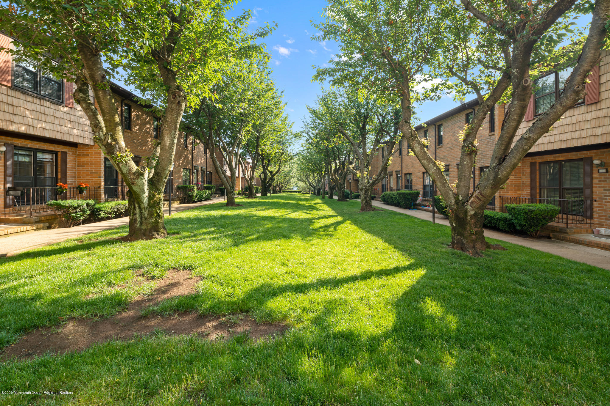 321 Spring Street, Unit 29 Red Bank, NJ 07701 - Photo 20 of 21 a view of a park with large trees