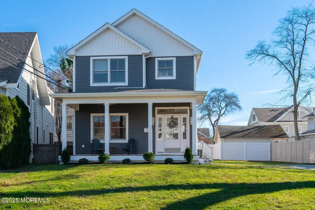 a view of a house with a yard and plants