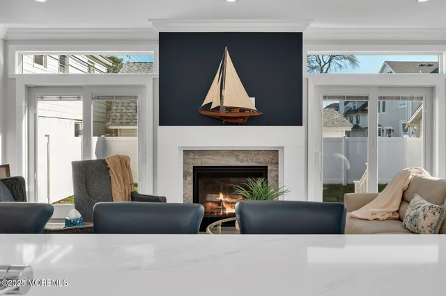 a bathroom with a granite countertop sink a toilet and a mirror