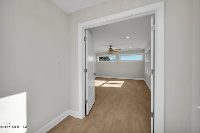 a front view of a house with a garden and porch