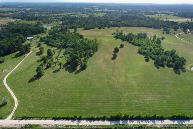 a view of a chairs and table on the deck