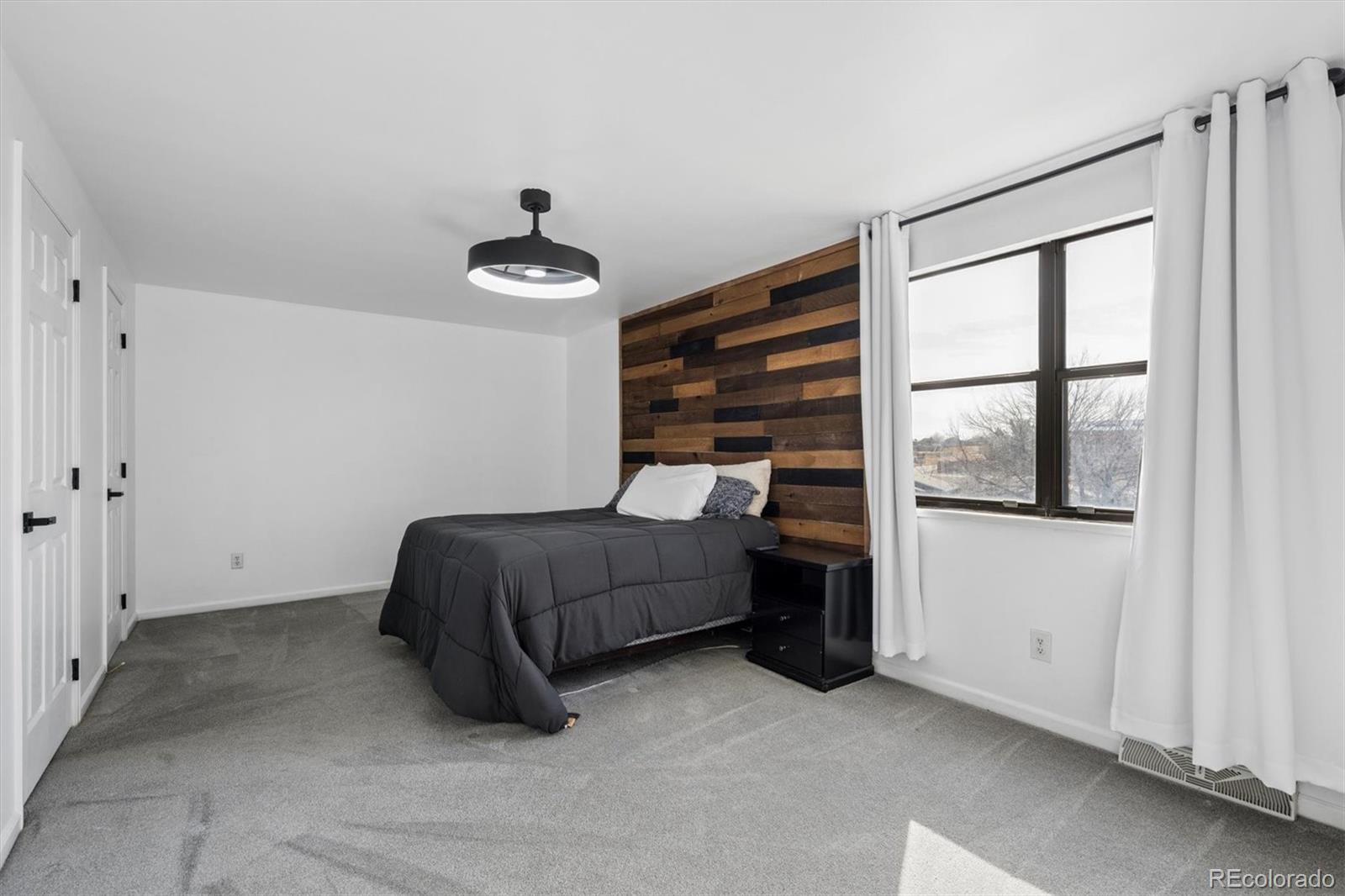 10433 Garrison Street Broomfield, CO 80021 - Photo 13 of 30 a bedroom with a bed and a window
