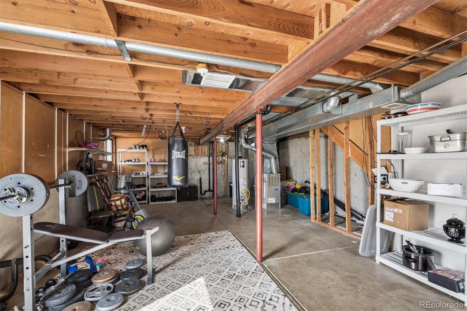10433 Garrison Street Broomfield, CO 80021 - Photo 18 of 30 a view of a room with gym equipment