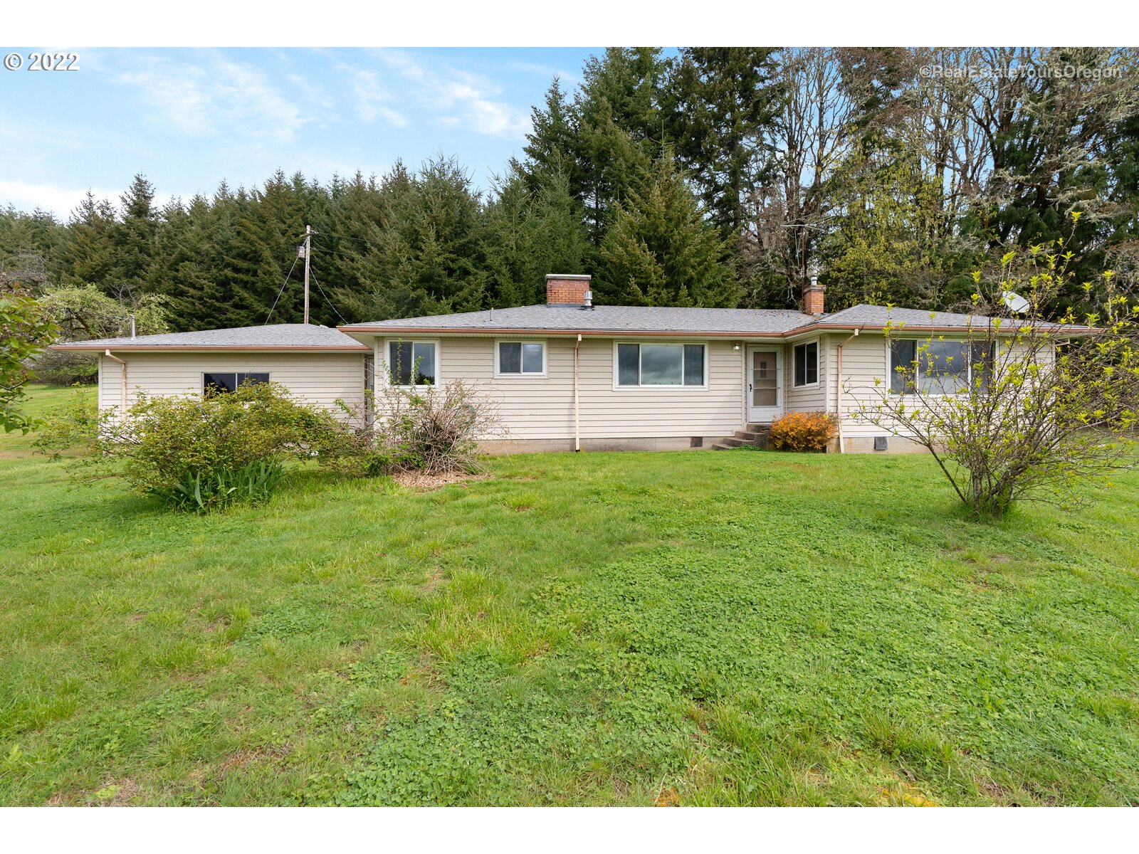 54795 Southwest Roberts School Road Gaston, OR 97119 - Photo 1 of 32 a view of a house with a yard