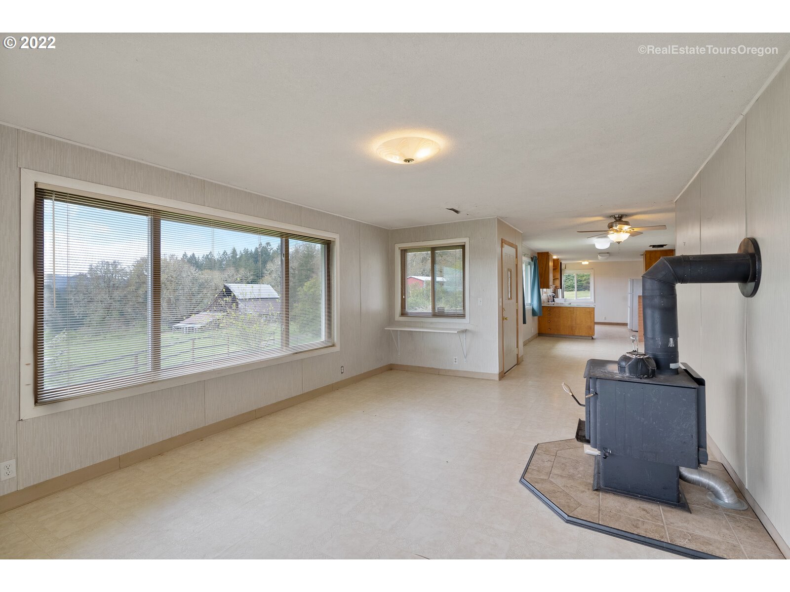 54795 Southwest Roberts School Road Gaston, OR 97119 - Photo 3 of 32 a living room with furniture and a large window