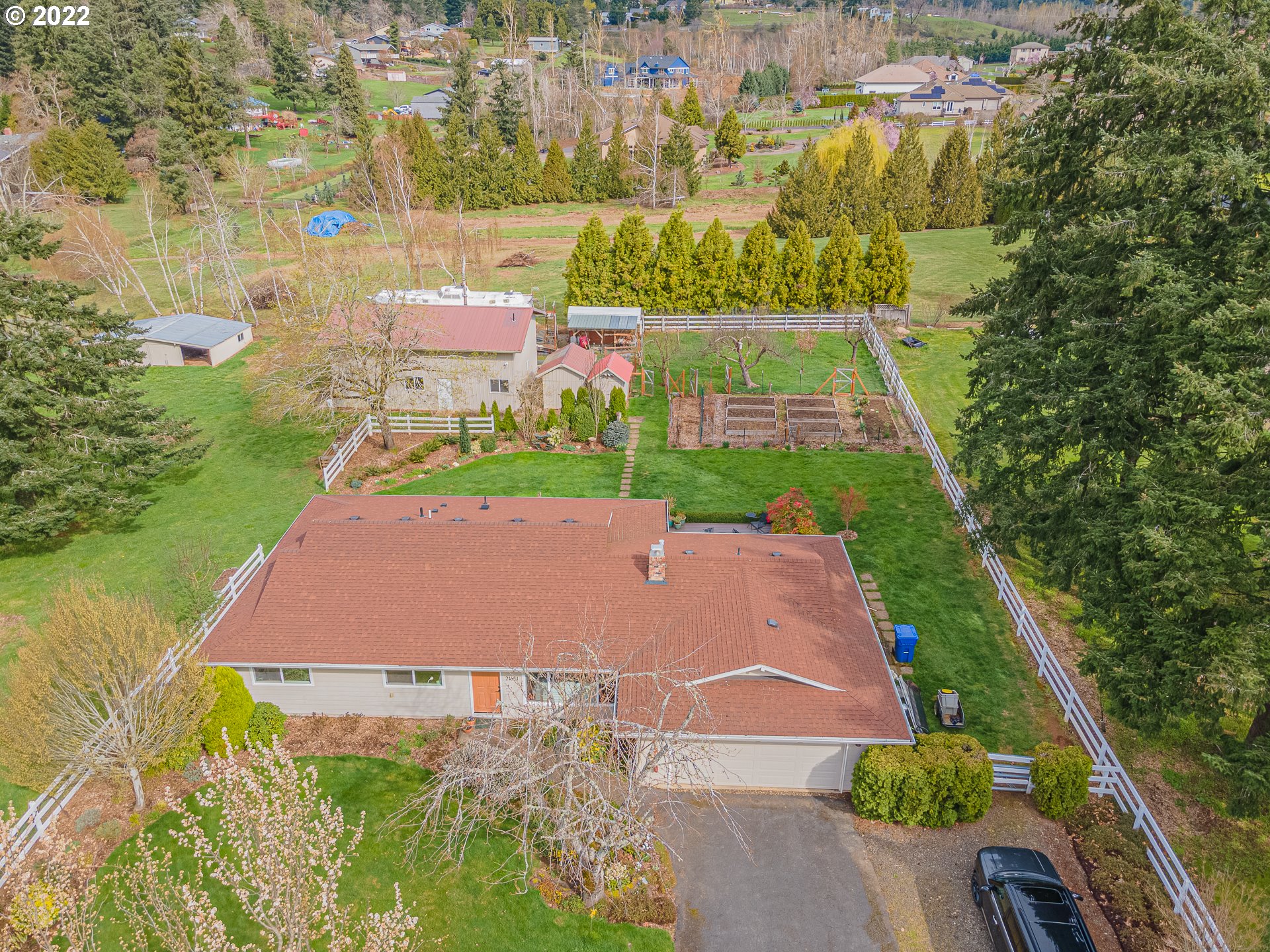 21651 Southeast Mark Road Damascus, OR 97089 - Photo 30 of 32 an aerial view of a house with a yard