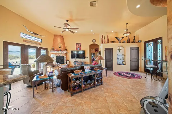 a dinning area with furniture and kitchen view