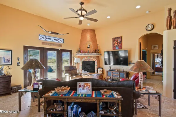 a kitchen with stainless steel appliances a sink stove and cabinets