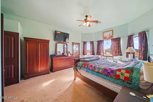 a view of a garage with a bike and a car