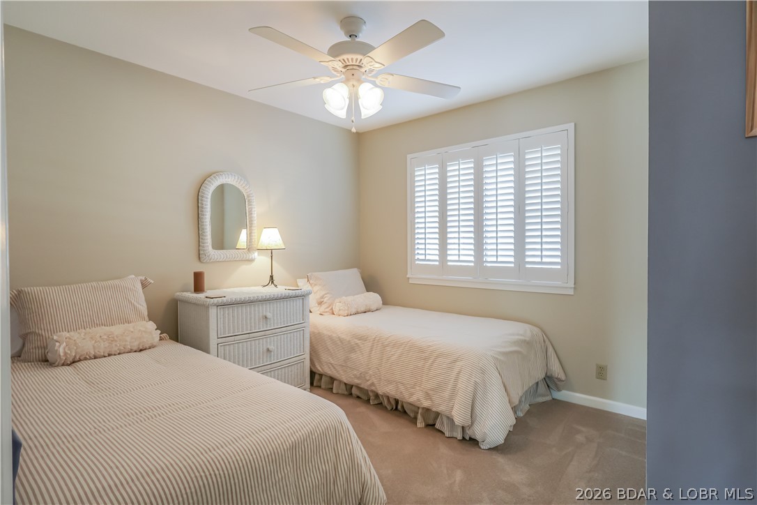 611 Lazy Days Road, Unit D 12 Osage Beach, MO 65065 - Photo 15 of 45 darling guest bedroom
