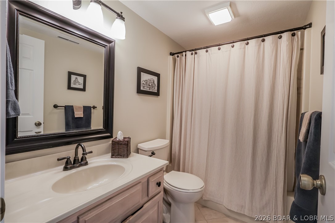 611 Lazy Days Road, Unit D 12 Osage Beach, MO 65065 - Photo 18 of 45 hall bath for guests