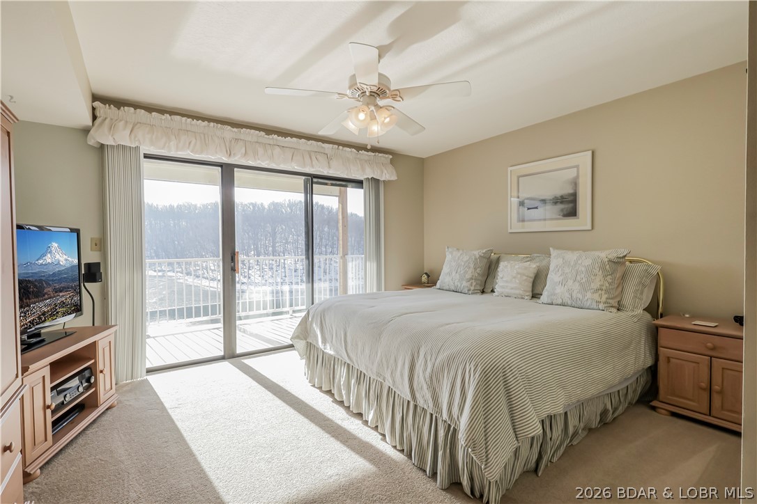 611 Lazy Days Road, Unit D 12 Osage Beach, MO 65065 - Photo 19 of 45 spacious master bedroom with a great view