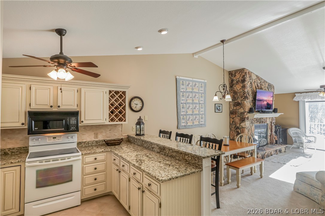 611 Lazy Days Road, Unit D 12 Osage Beach, MO 65065 - Photo 2 of 45 UPdated kitchen with under counter lighting