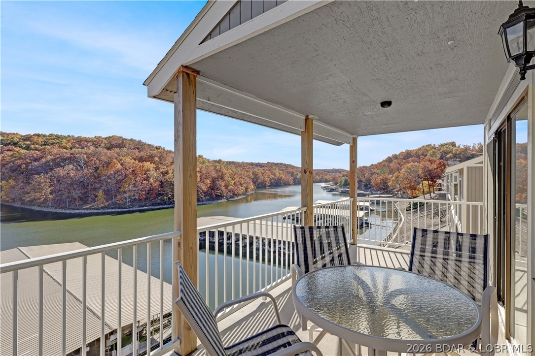 611 Lazy Days Road, Unit D 12 Osage Beach, MO 65065 - Photo 26 of 45 both covered and uncovered deck