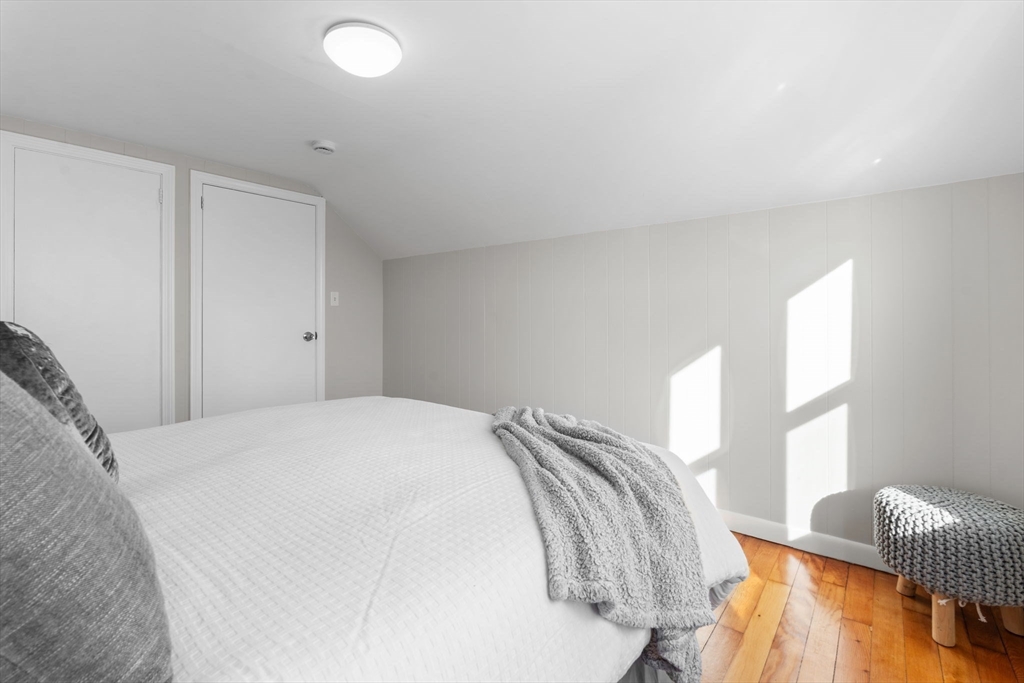 368 Read Street Somerset, MA 02726 - Photo 18 of 35 a bedroom with a bed and a window