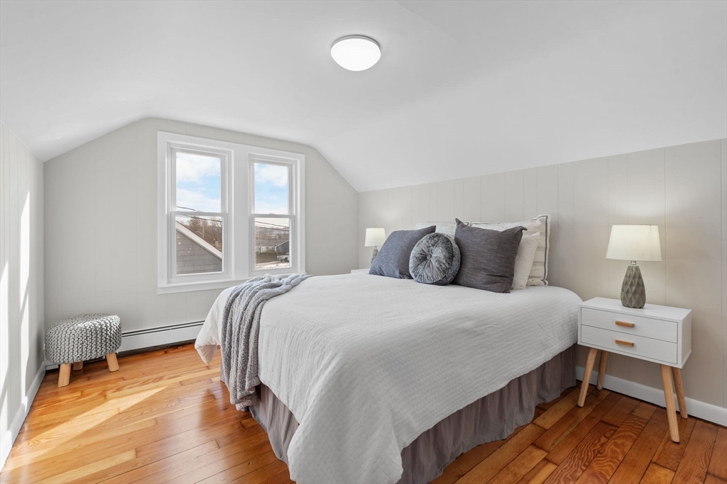 368 Read Street Somerset, MA 02726 - Photo 20 of 35 a bedroom with a bed and wooden floor