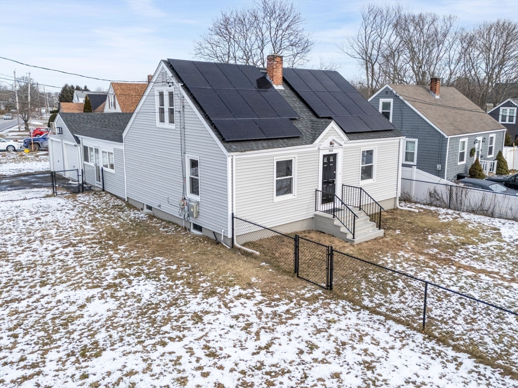 368 Read Street Somerset, MA 02726 - Photo 2 of 35 a view of a white house next to a yard with large trees