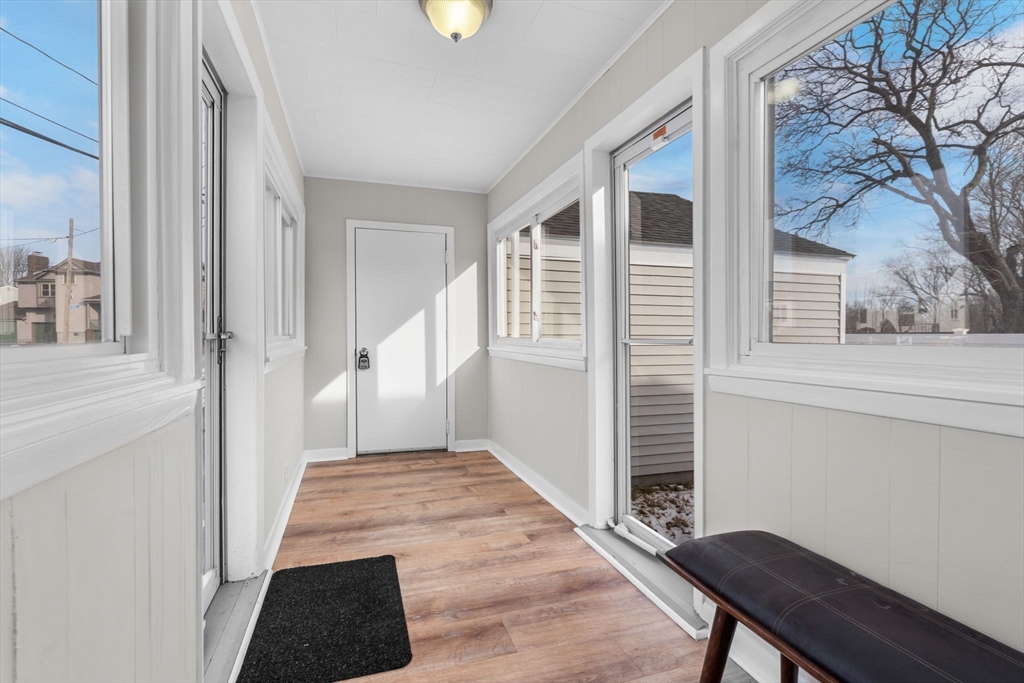 368 Read Street Somerset, MA 02726 - Photo 27 of 35 a view of a hallway with windows and stairs
