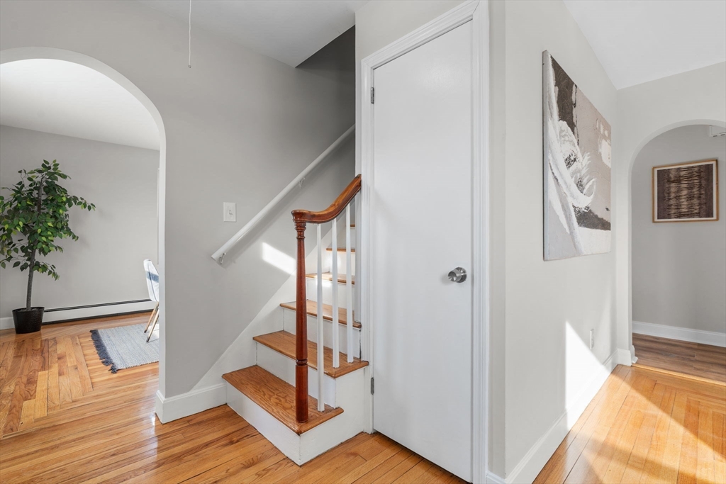 368 Read Street Somerset, MA 02726 - Photo 3 of 35 a view of entryway with wooden floor and stairs