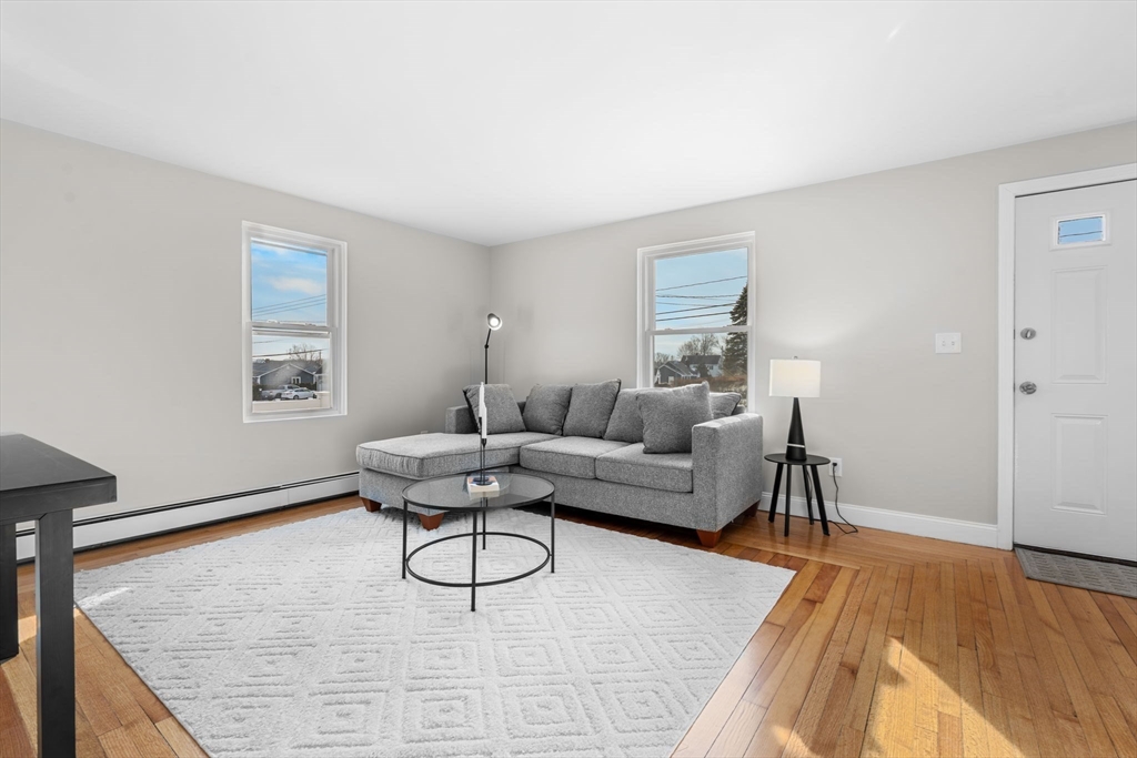 368 Read Street Somerset, MA 02726 - Photo 5 of 35 a living room with furniture and wooden floor