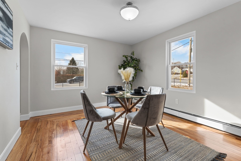 368 Read Street Somerset, MA 02726 - Photo 7 of 35 a dining room with furniture and wooden floor