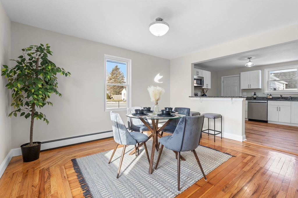 368 Read Street Somerset, MA 02726 - Photo 8 of 35 a view of a dining room with furniture and wooden floor