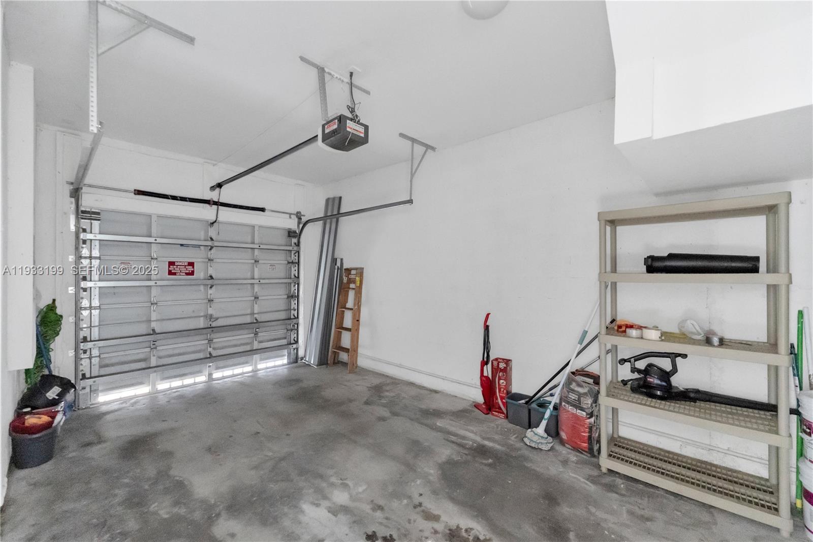 10934 Southwest 247th Terrace Homestead, FL 33032 - Photo 18 of 28 a view of car garage