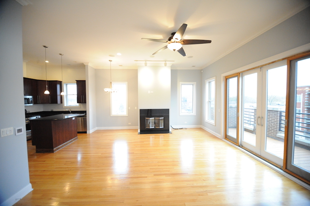 2903 West Irving Park Road, Unit 1 Chicago, IL 60618 - Photo 11 of 15 a view of a kitchen with a sink and a kitchen view