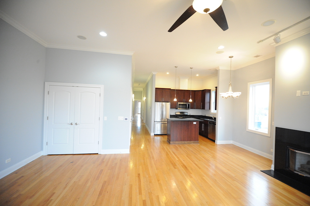 2903 West Irving Park Road, Unit 1 Chicago, IL 60618 - Photo 10 of 15 a view of kitchen with sink microwave and stove