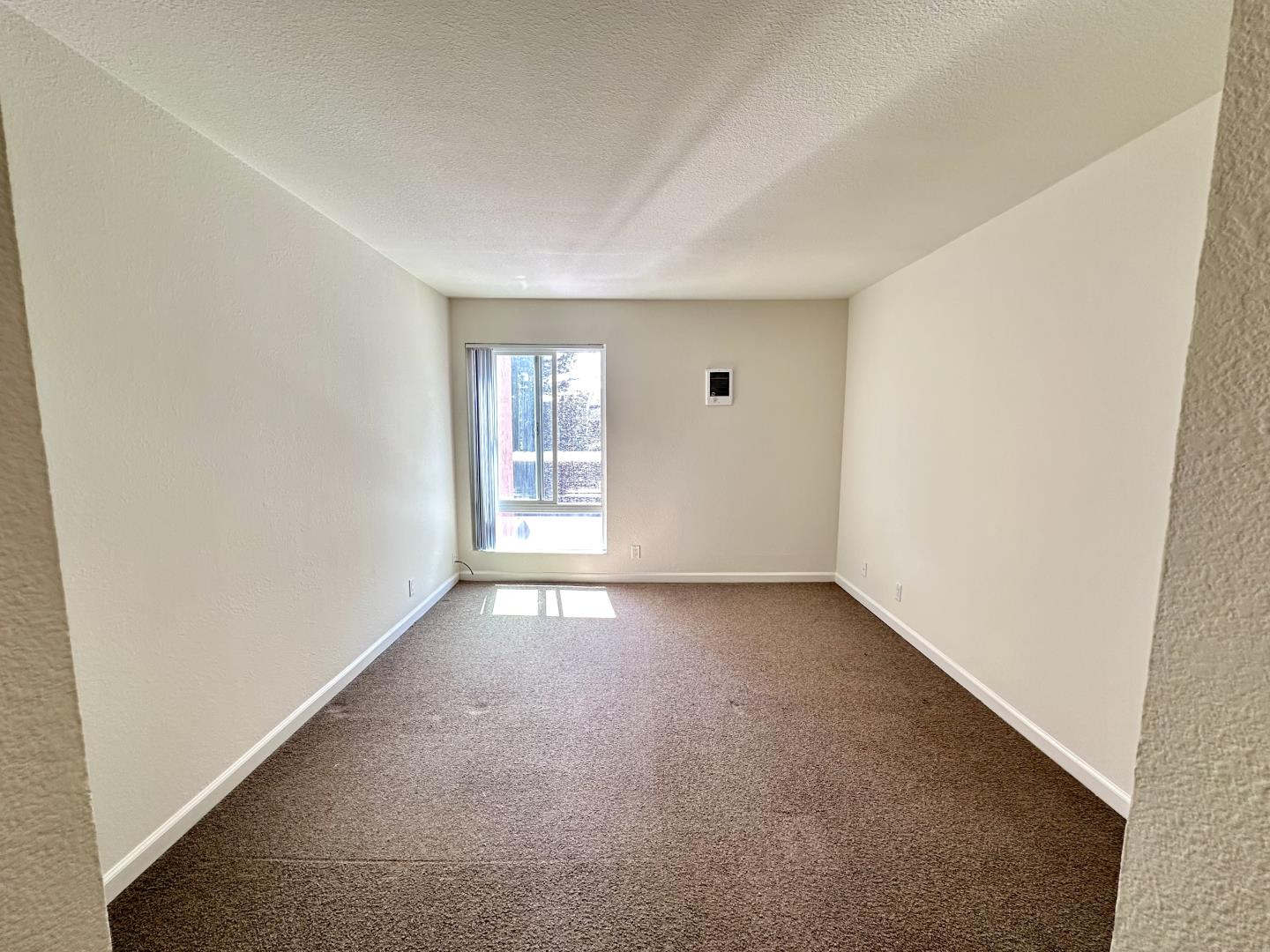 436 Dempsey Road, Unit 238 Milpitas, CA 95035 - Photo 3 of 16 an empty room with windows