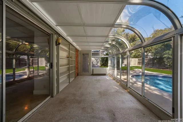 a view of a house with a swimming pool