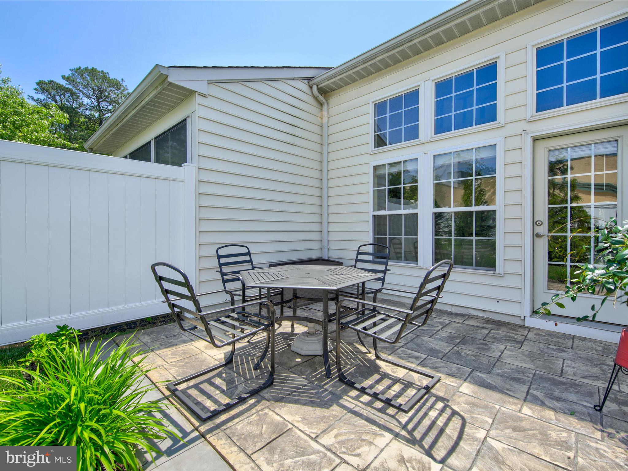 17 Thornberry Road, Unit 7 Millville, DE 19967 - Photo 42 of 46 Stamped Concrete Patio