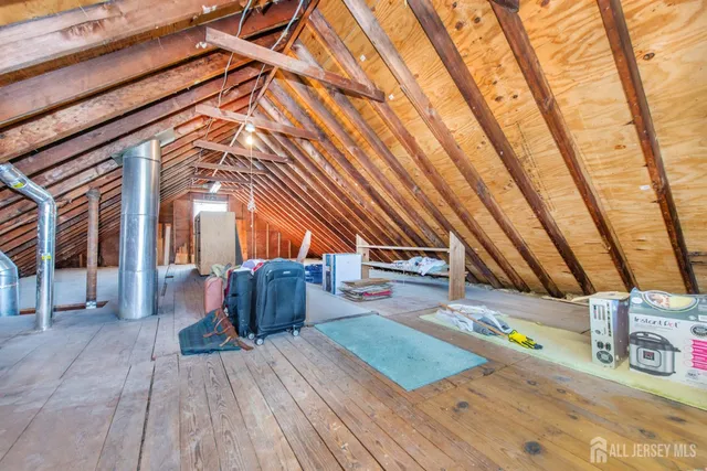 a backyard of a house with wooden floor and outdoor space