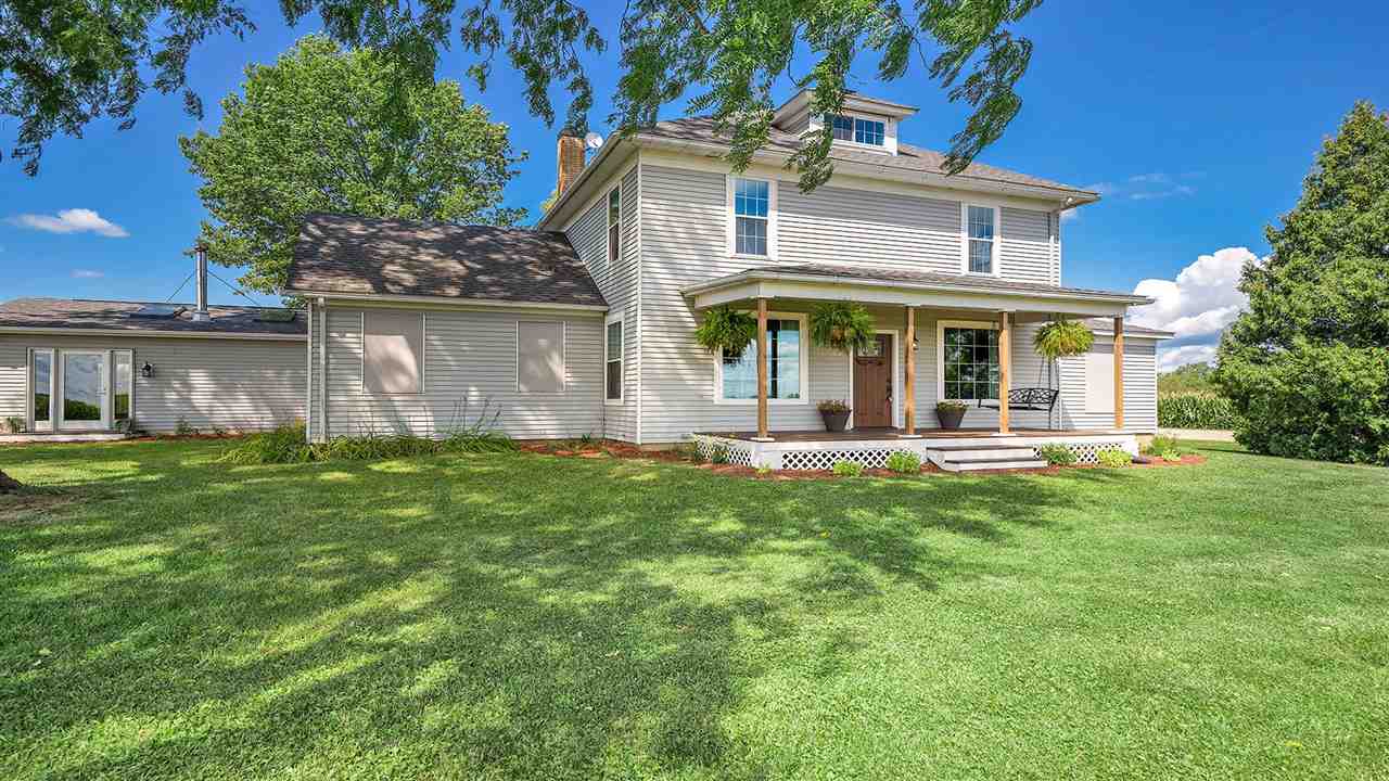 1652 South Columbian Road Oregon, IL 61061 - Photo 32 of 40 a front view of a house with a yard