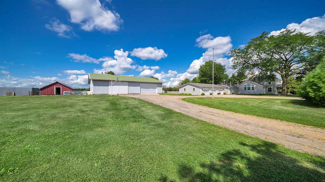1652 South Columbian Road Oregon, IL 61061 - Photo 33 of 40 a view of a house with a big yard