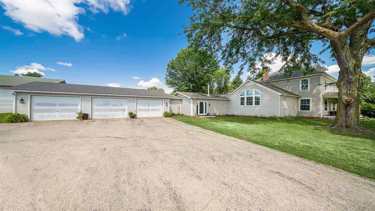 1652 South Columbian Road Oregon, IL 61061 - Photo 36 of 40 a front view of house with yard and garage