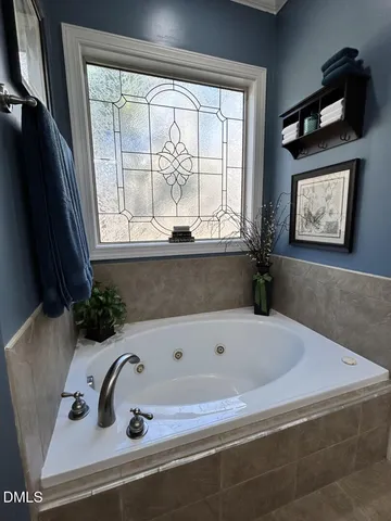 a bathroom with a bathtub