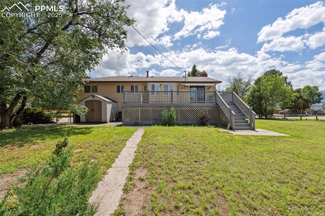 1244 Baron Road Colorado Springs, CO 80920 - Photo 38 of 44 Large backyard with storage shed